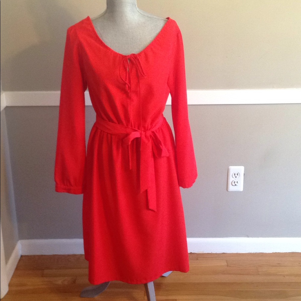 Red belted long sleeved dress